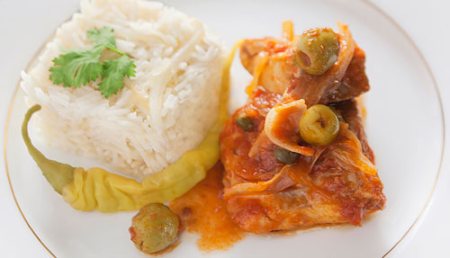 Veracruz Style Fish accompanied with a white rice