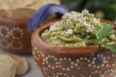 Poblano Pepper Guacamole accompanied with tortilla chips